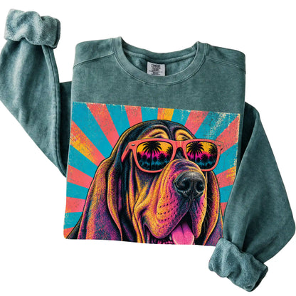 Folded Blue Spruce Comfort Colors sweatshirt with a Retro Bloodhound Mama design