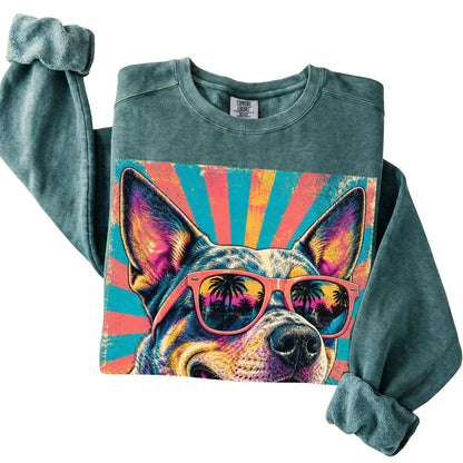Folded Blue Spruce Comfort Colors sweatshirt with a Retro Blue Heeler Mama design