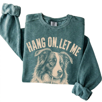 Blue Spruce Comfort Colors sweatshirt featuring Border Collie Iced Coffee Overthink, folded presentation