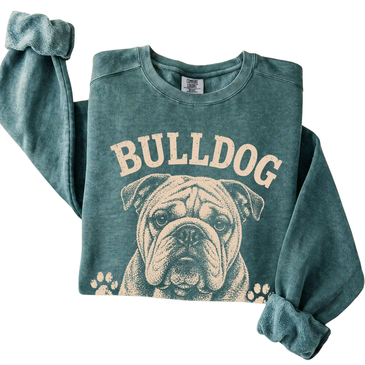 Blue Spruce Comfort Colors® sweatshirt featuring Built Tough, Runs On Snacks - Bulldog, folded presentation