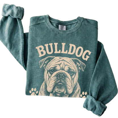Blue Spruce Comfort Colors® sweatshirt featuring Built Tough, Runs On Snacks - Bulldog, folded presentation