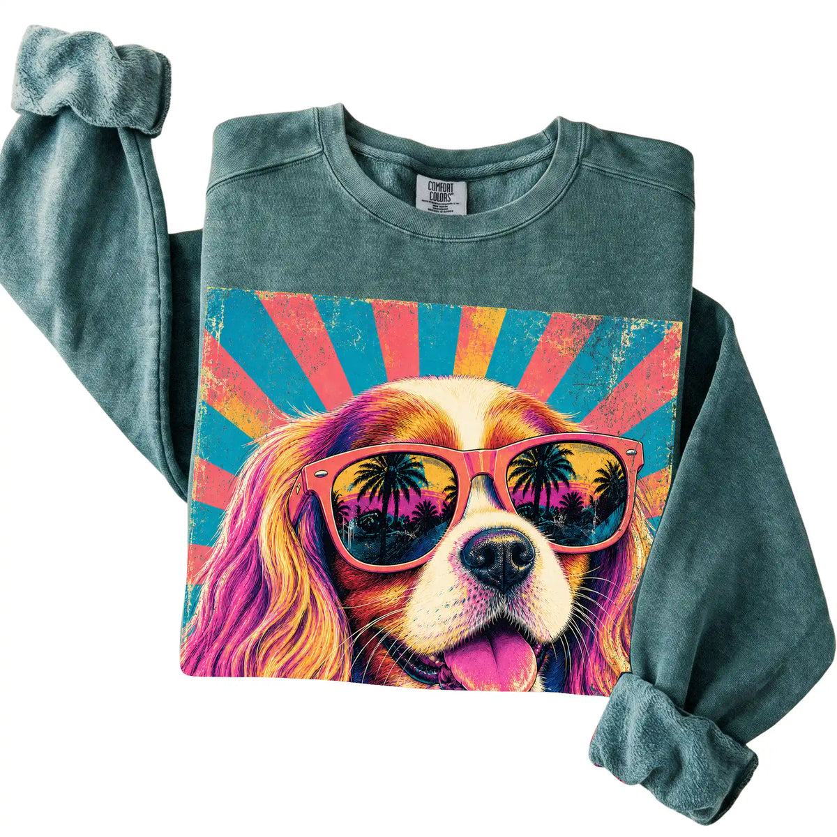 Folded Blue Spruce Comfort Colors sweatshirt with a Retro Cavalier King Charles Spaniel Mama design