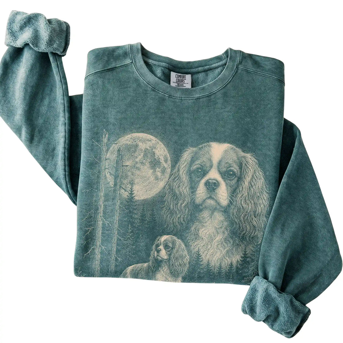 Blue Spruce Cavalier King Charles Spaniel Moonlit Forest Comfort Colors sweatshirt, folded view