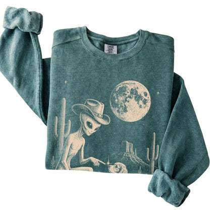 Blue Spruce Comfort Colors® sweatshirt featuring Cocker Spaniel Cowboy and Alien, folded presentation