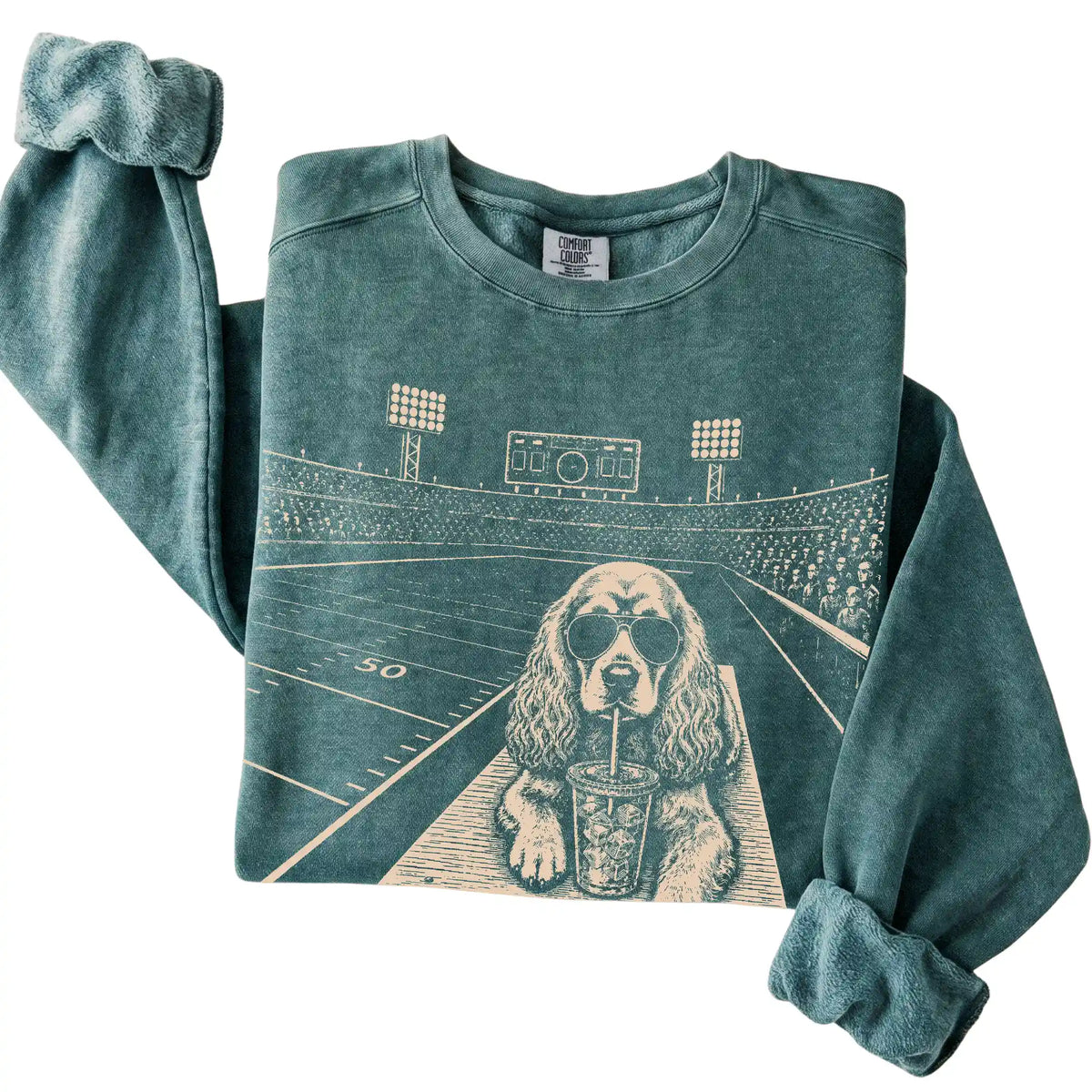 Folded Blue Spruce Cocker Spaniel Football Tailgate sweatshirt