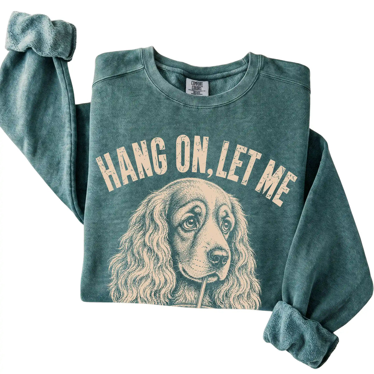Blue Spruce Comfort Colors sweatshirt featuring Cocker Spaniel Iced Coffee Overthink, folded presentation
