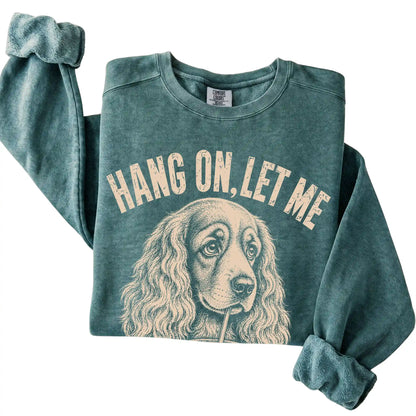 Blue Spruce Comfort Colors sweatshirt featuring Cocker Spaniel Iced Coffee Overthink, folded presentation