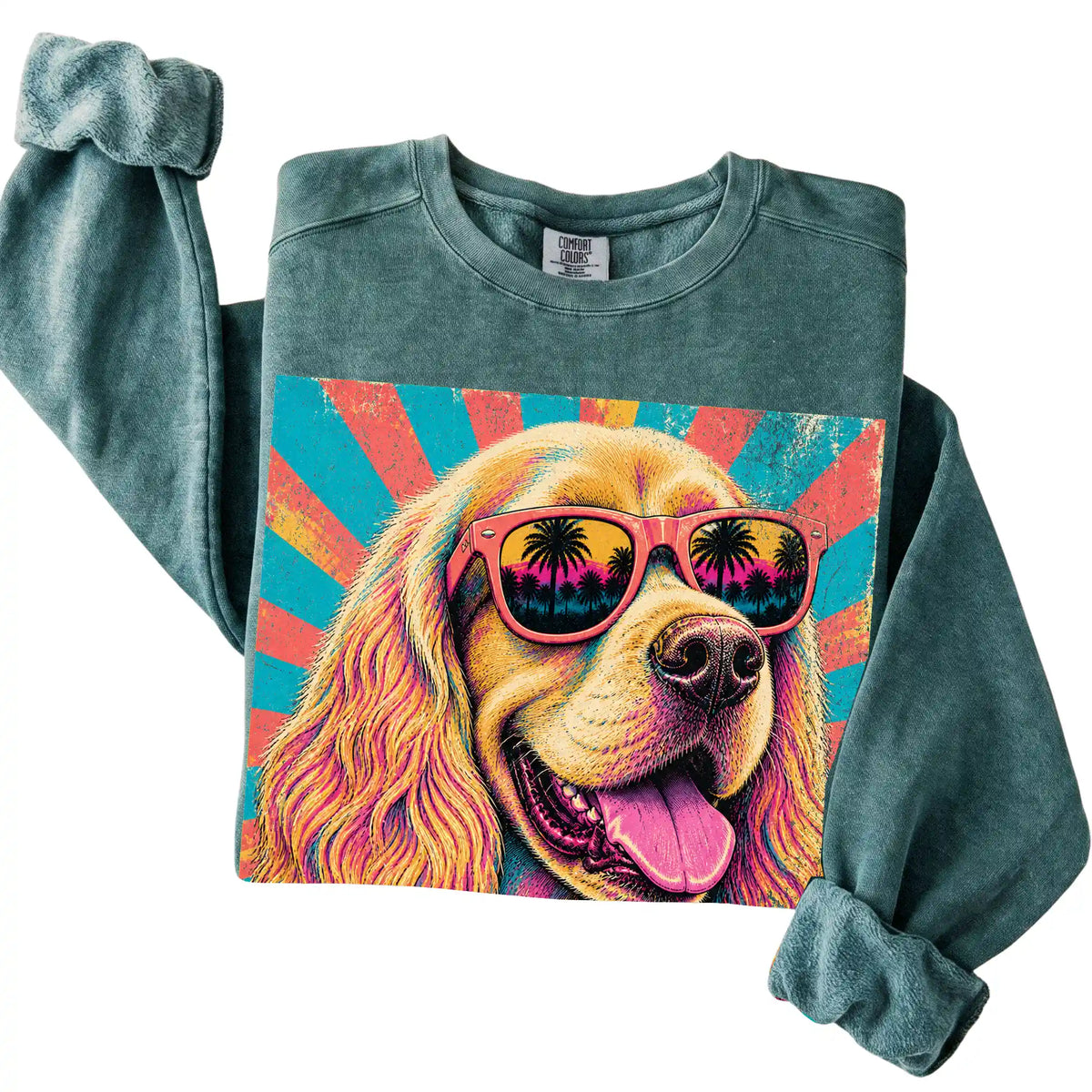 Folded Blue Spruce Comfort Colors sweatshirt with a Retro Cocker Spaniel Mama design