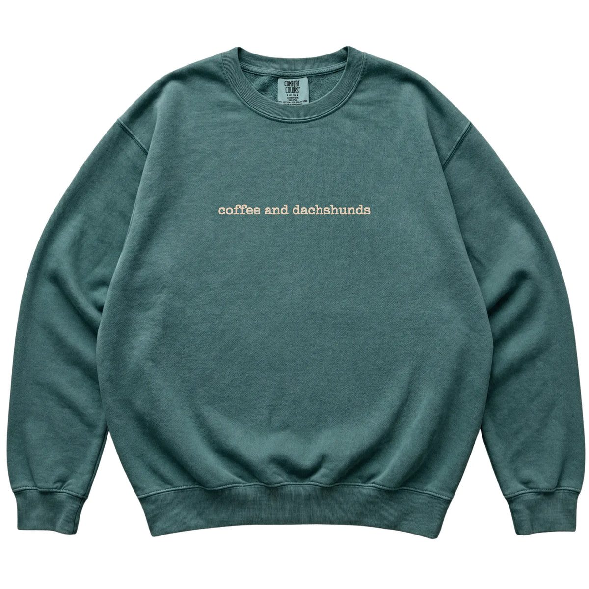 Blue Spruce Coffee and Dachshunds Comfort Colors sweatshirt laid flat