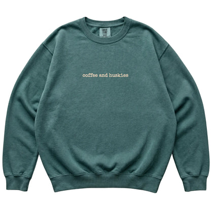 Blue Spruce Coffee and Huskies Comfort Colors sweatshirt laid flat
