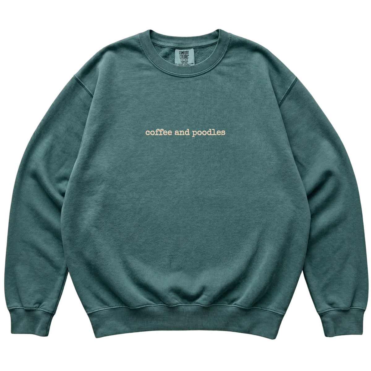 Blue Spruce Coffee and Poodles Comfort Colors sweatshirt laid flat