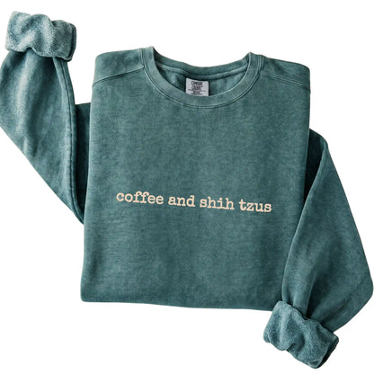 Blue Spruce Coffee and Shih Tzus Comfort Colors sweatshirt folded to show the printed design
