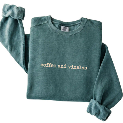 Blue Spruce Coffee and Vizslas Comfort Colors sweatshirt folded to show the printed design
