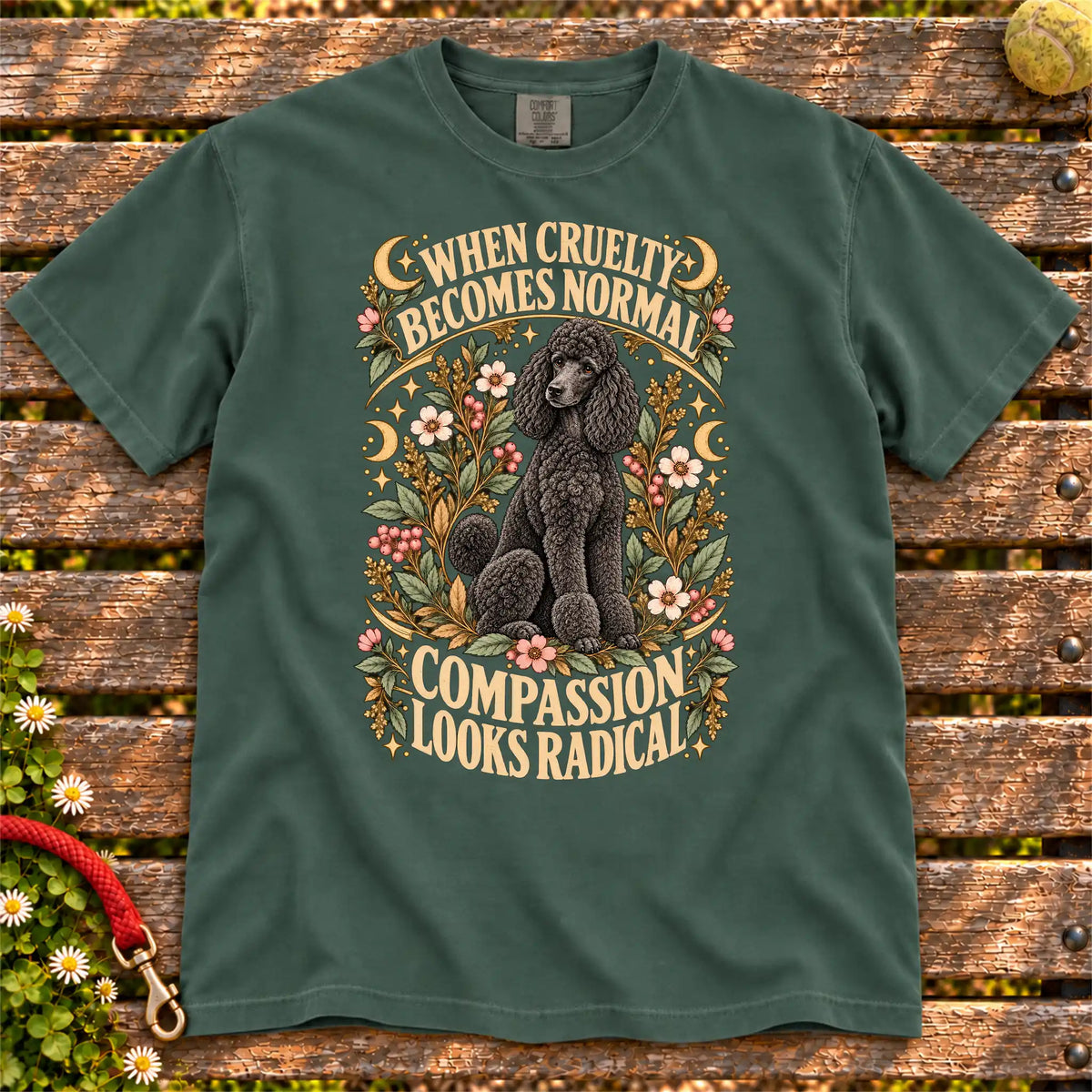 Compassion Looks Radical Poodle design on a Blue Spruce Comfort Colors T-shirt