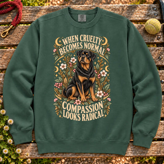 Compassion Looks Radical Rottweiler design on a Blue Spruce Comfort Colors sweatshirt