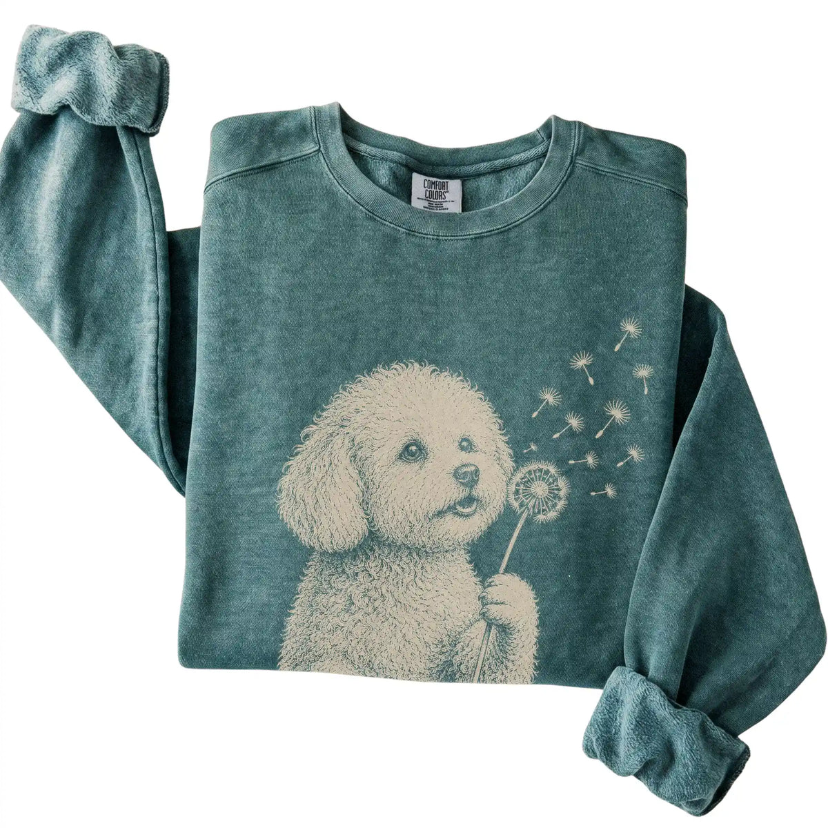 Blue Spruce Comfort Colors® sweatshirt featuring Dandelion Bichon Frise, folded presentation