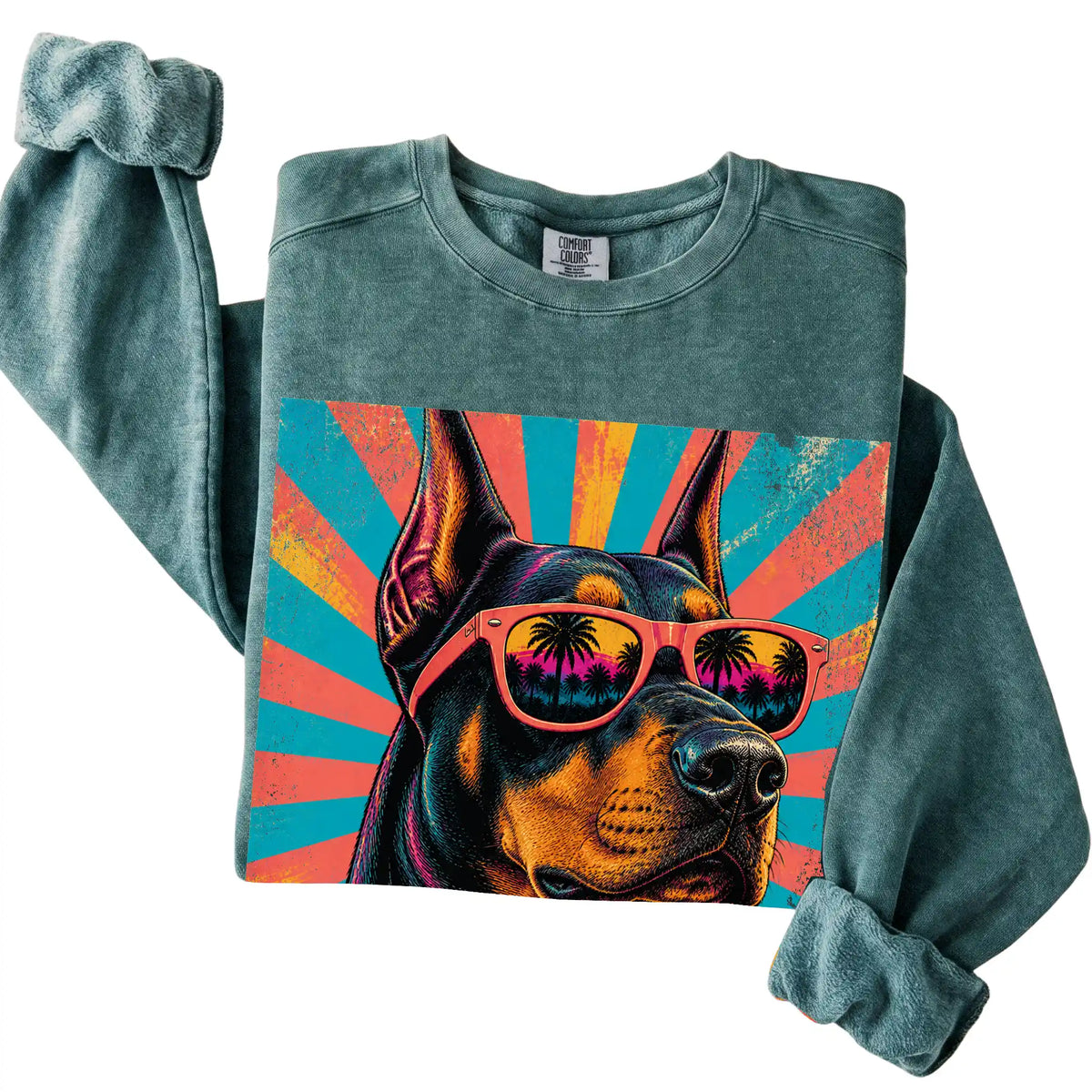 Folded Blue Spruce Comfort Colors sweatshirt with a Retro Doberman Mama design