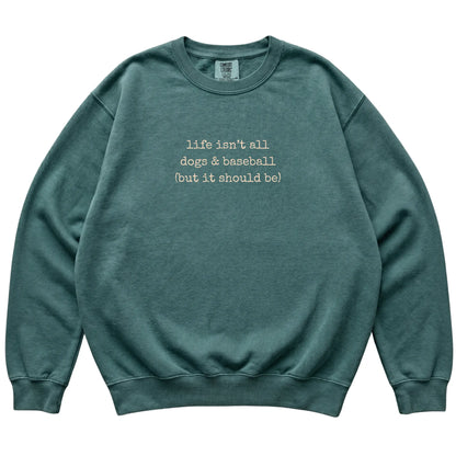 Blue Spruce Dogs and Baseball Comfort Colors sweatshirt laid flat