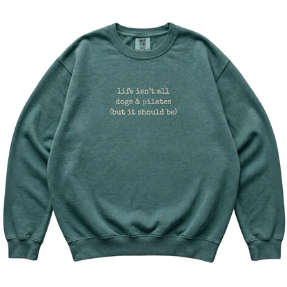 Blue Spruce Dogs and Pilates Comfort Colors sweatshirt laid flat