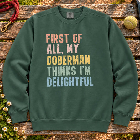 “First of all, my Doberman thinks I’m delightful” text on a Blue Spruce sweatshirt
