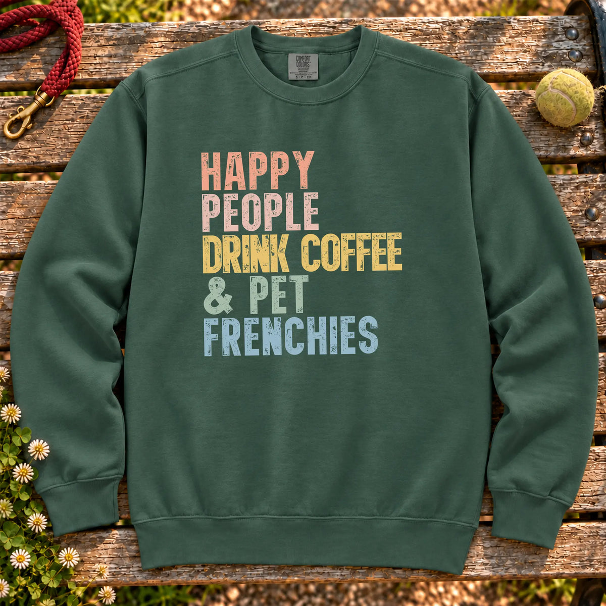 “Happy people drink coffee & pet French Bulldogs” text on a Blue Spruce sweatshirt