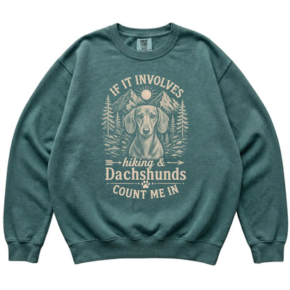 Blue Spruce Comfort Colors® sweatshirt featuring Hiking and Dachshunds, laid-flat presentation