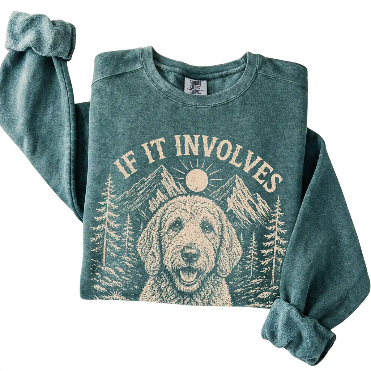 Blue Spruce Comfort Colors® sweatshirt featuring Hiking and Labradoodles, folded presentation