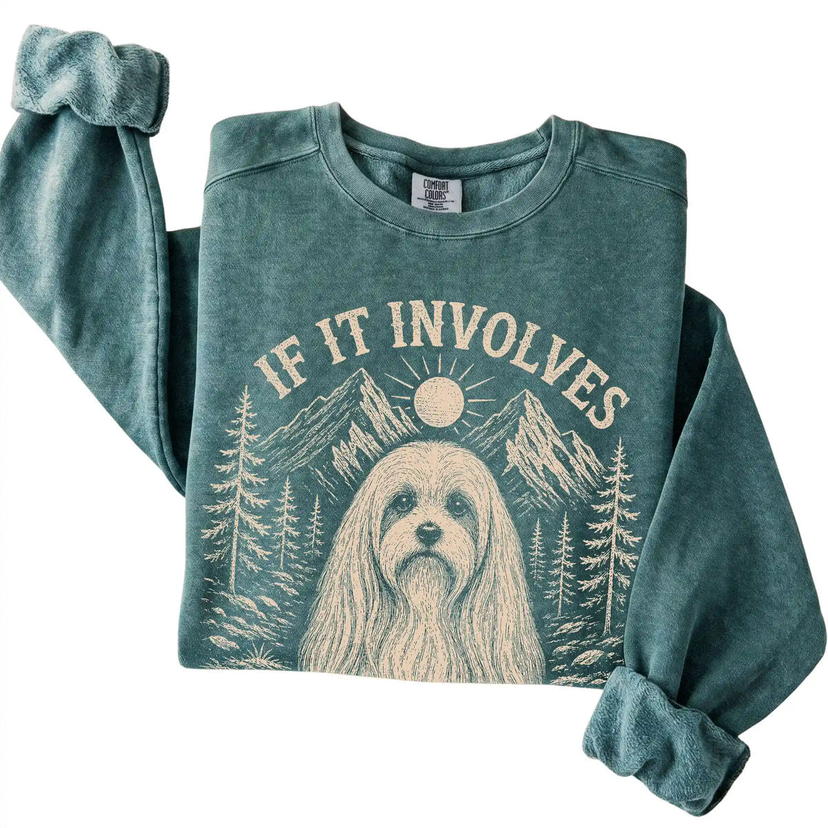 Blue Spruce Comfort Colors® sweatshirt featuring Hiking and Maltese, folded presentation