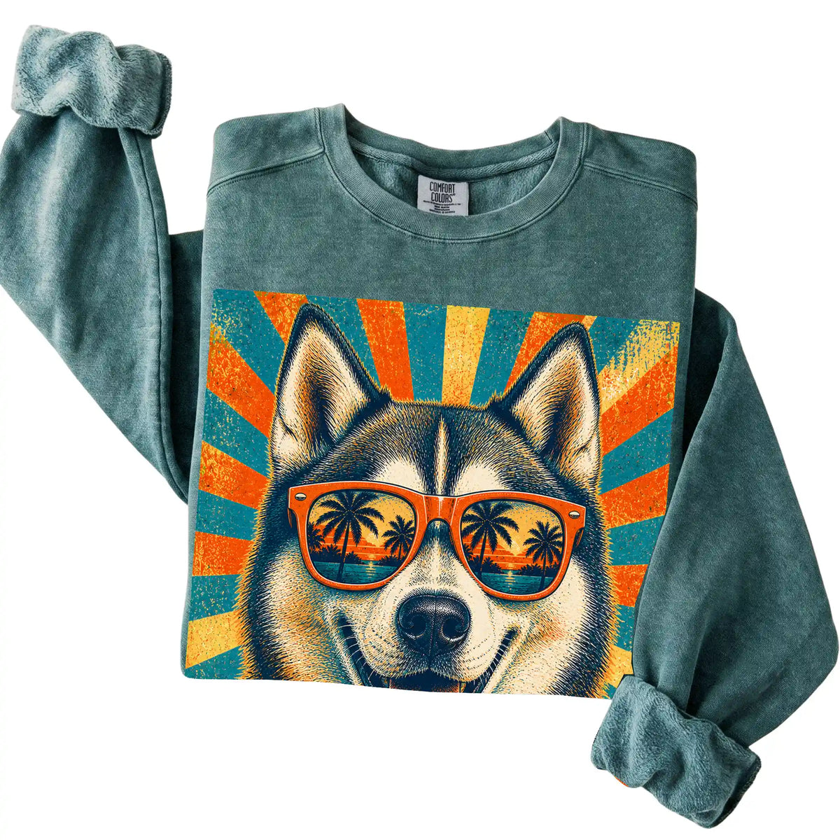 Folded Blue Spruce Comfort Colors sweatshirt with a Retro Husky Dad design