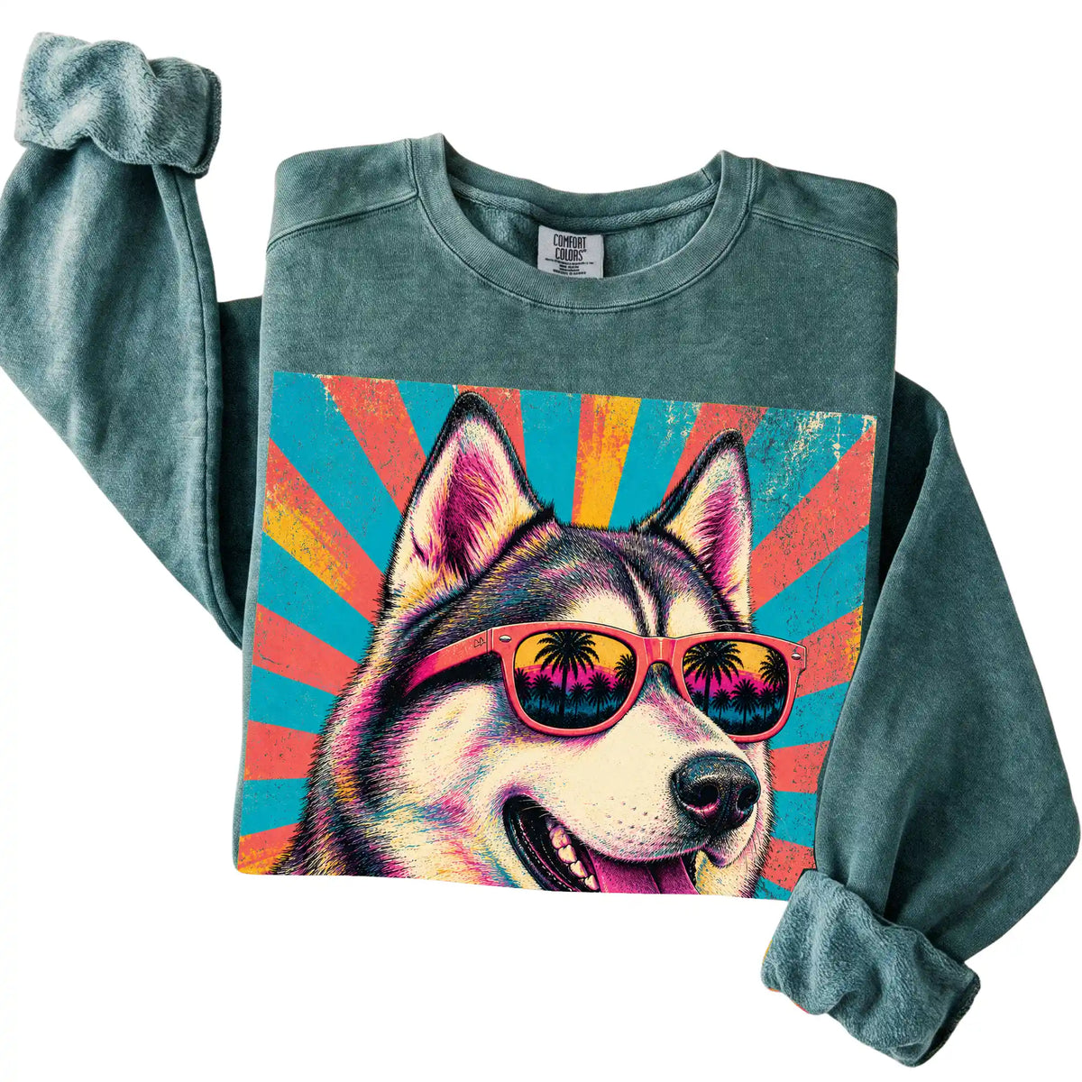 Folded Blue Spruce Comfort Colors sweatshirt with a Retro Husky Mama design