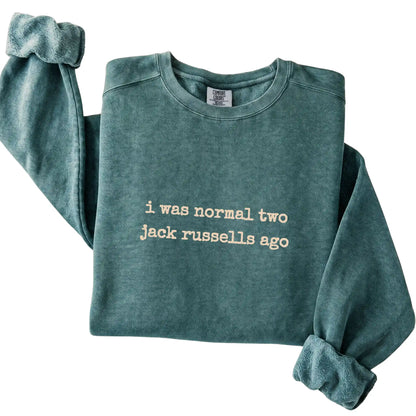 Blue Spruce I Was Normal Two Jack Russells Ago Comfort Colors sweatshirt folded to show the printed design
