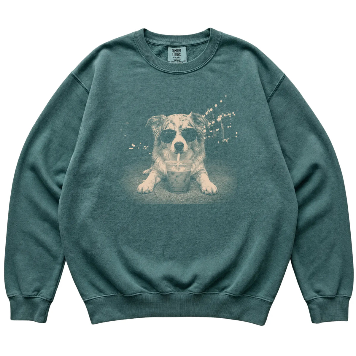 Australian Shepherd wearing aviator sunglasses and drinking iced coffee on a Blue Spruce Comfort Colors 1566 Sweatshirt, flat lay view