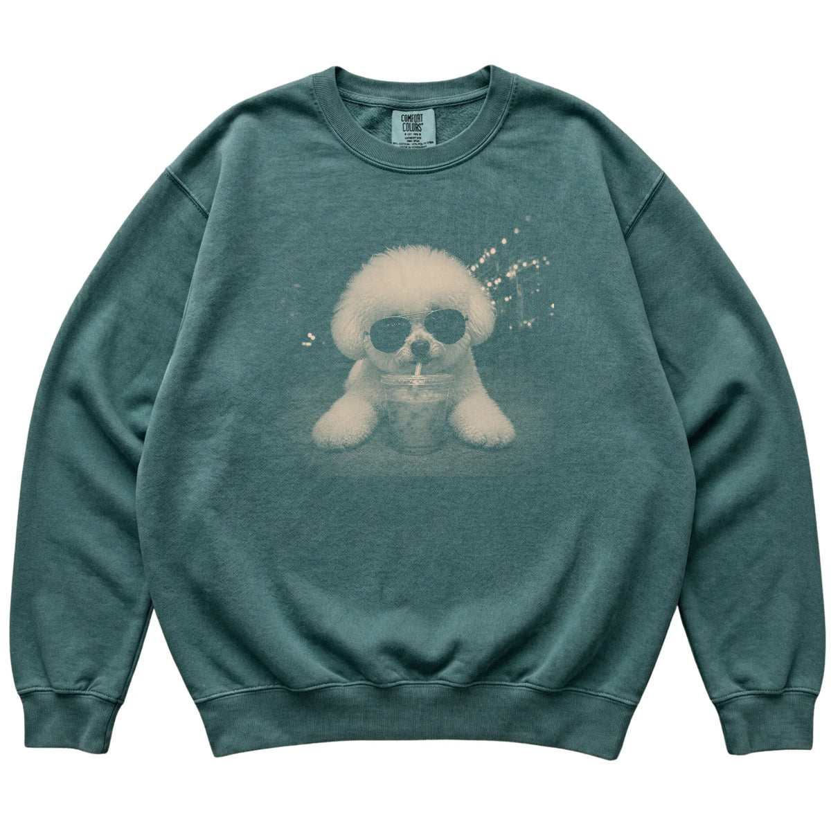Bichon Frise wearing aviator sunglasses and drinking iced coffee on a Blue Spruce Comfort Colors 1566 Sweatshirt, flat lay view