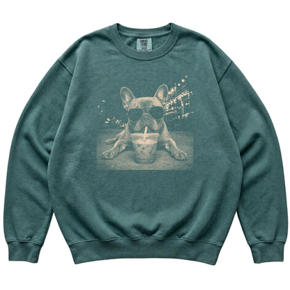 French Bulldog wearing aviator sunglasses and drinking iced coffee on a Blue Spruce Comfort Colors 1566 Sweatshirt, flat lay view