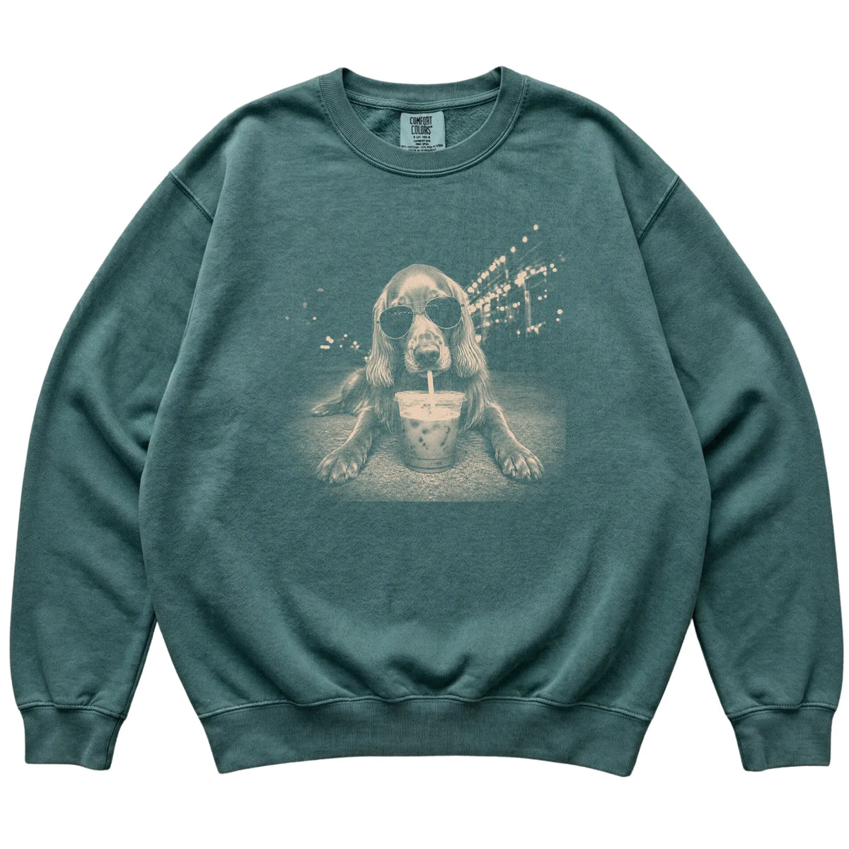 Irish Setter wearing aviator sunglasses and drinking iced coffee on a Blue Spruce Comfort Colors 1566 Sweatshirt, flat lay view