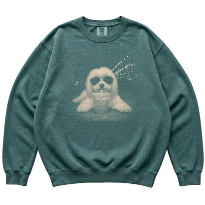 Maltese wearing aviator sunglasses and drinking iced coffee on a Blue Spruce Comfort Colors 1566 Sweatshirt, flat lay view