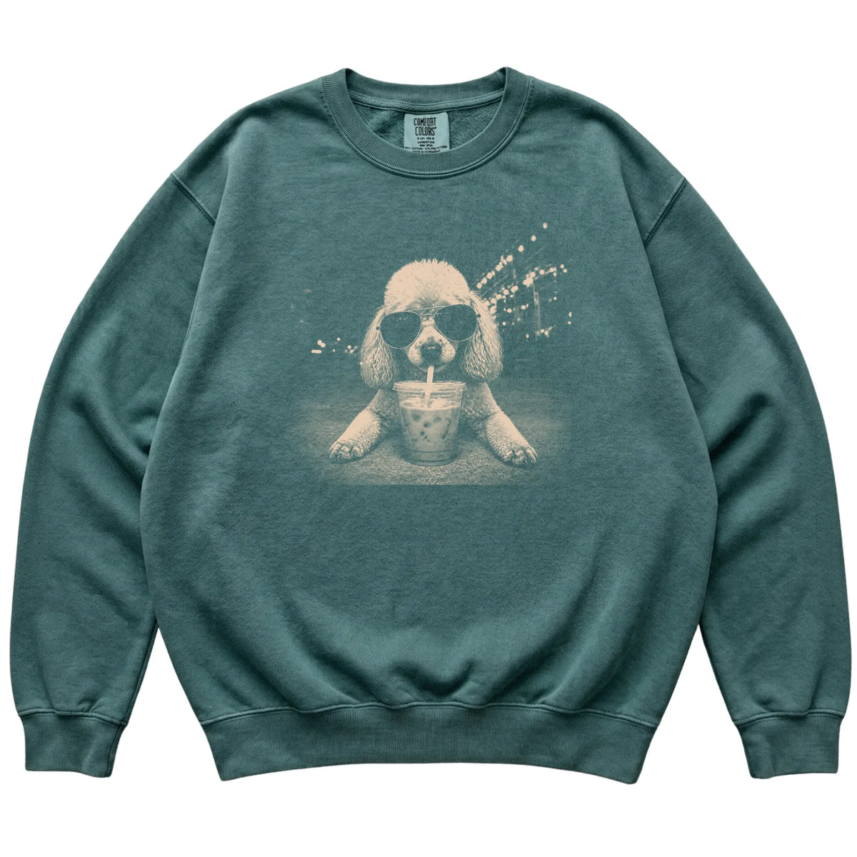 Poodle wearing aviator sunglasses and drinking iced coffee on a Blue Spruce Comfort Colors 1566 Sweatshirt, flat lay view