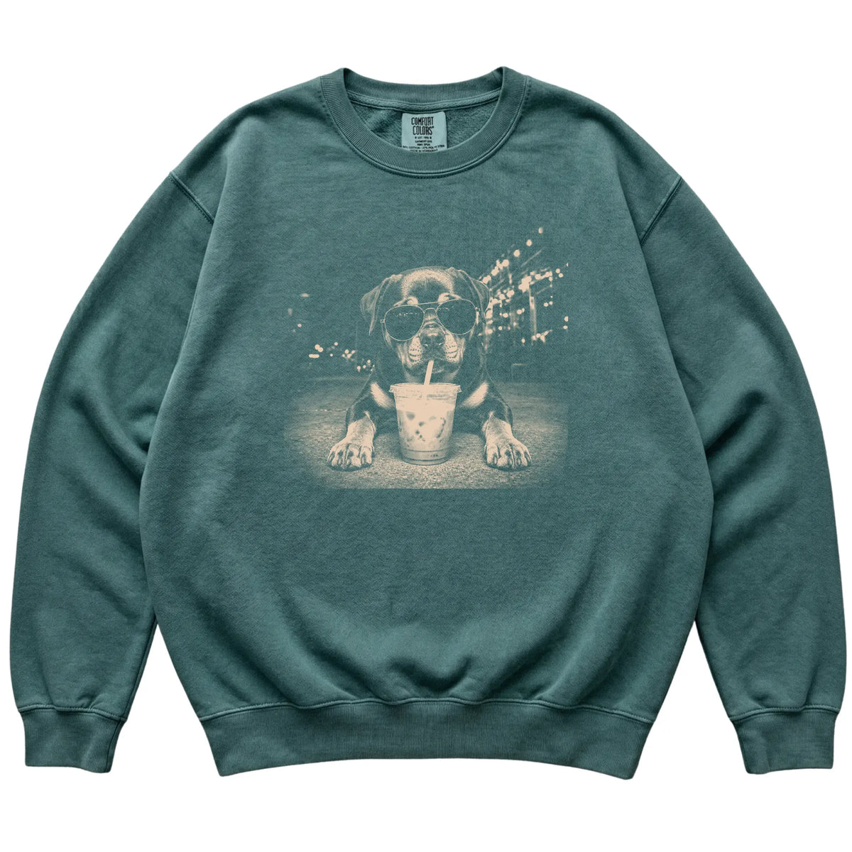 Rottweiler wearing aviator sunglasses and drinking iced coffee on a Blue Spruce Comfort Colors 1566 Sweatshirt, flat lay view