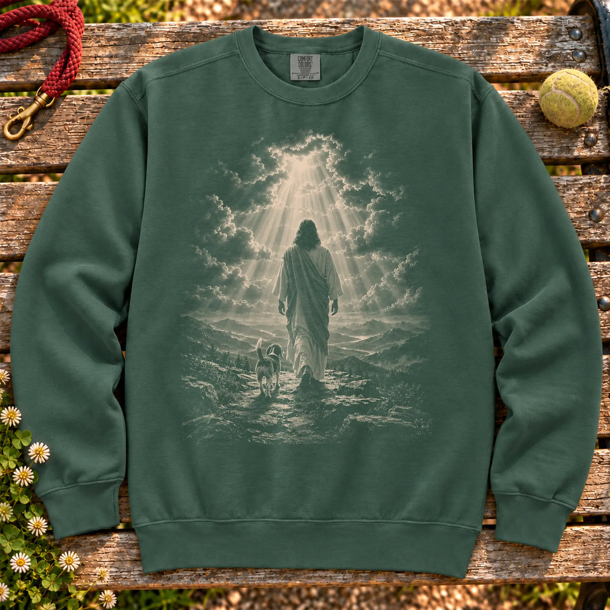 Blue Spruce sweatshirt showing Jesus walking beside a Beagle beneath rays of light
