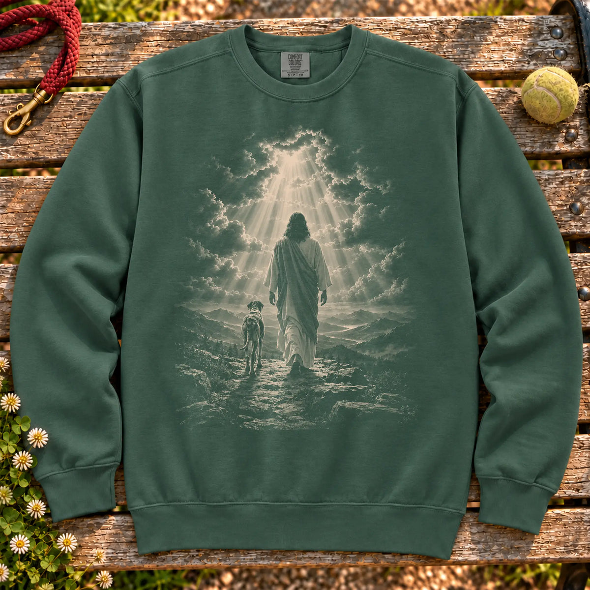 Blue Spruce sweatshirt showing Jesus walking beside a Great Dane beneath rays of light