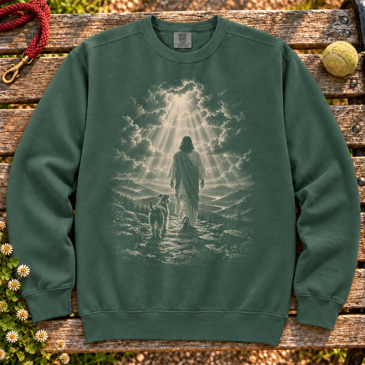 Blue Spruce sweatshirt showing Jesus walking beside a Schnauzer beneath rays of light