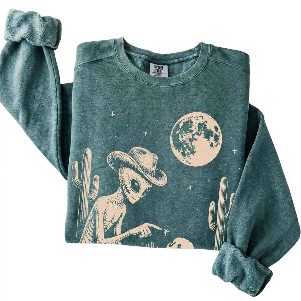 Blue Spruce Comfort Colors® sweatshirt featuring Maltese Cowboy and Alien, folded presentation