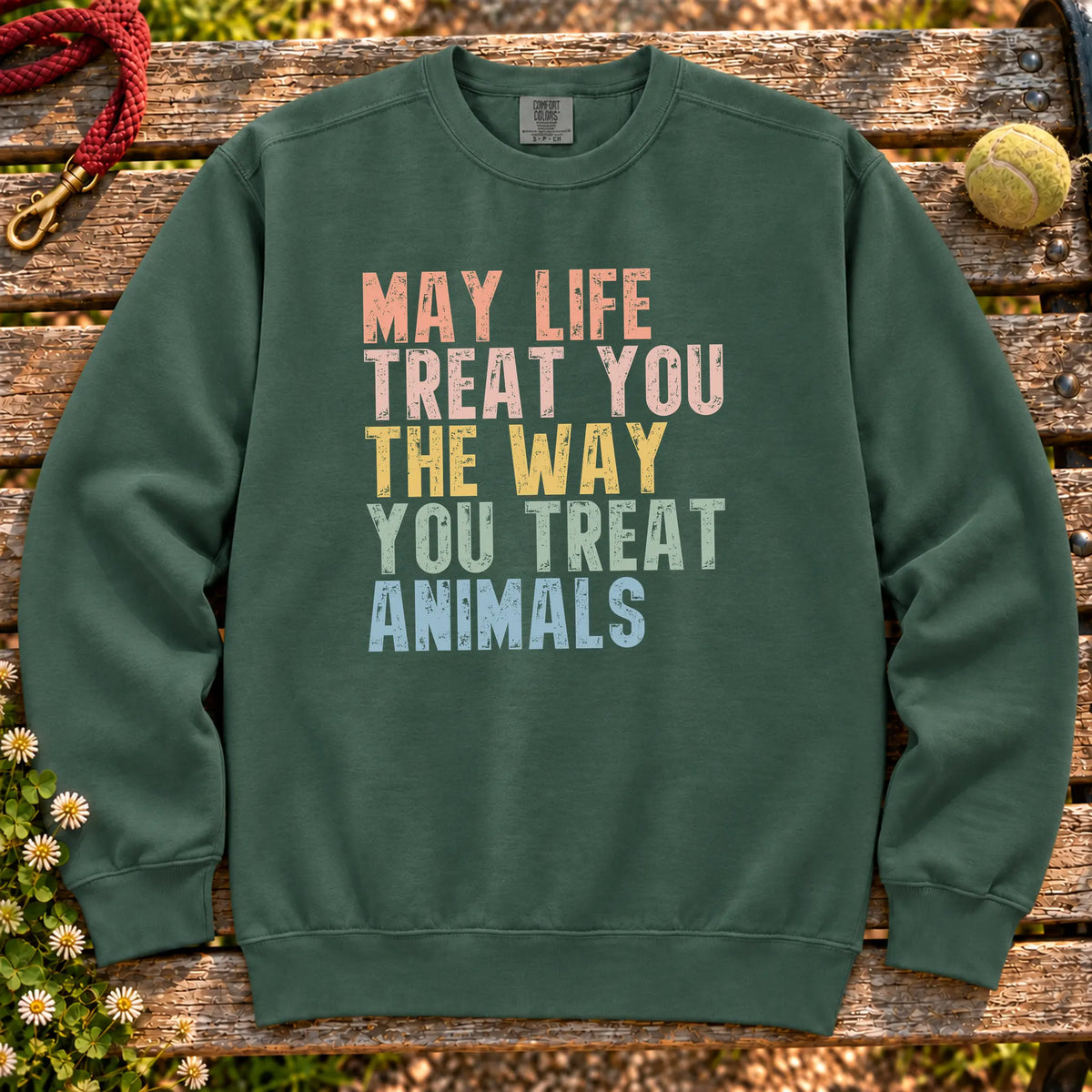 Colorful kindness to animals message on a Blue Spruce sweatshirt