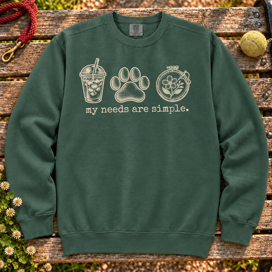 My Needs Are Simple coffee, dogs, and embroidery design on a Blue Spruce Comfort Colors sweatshirt