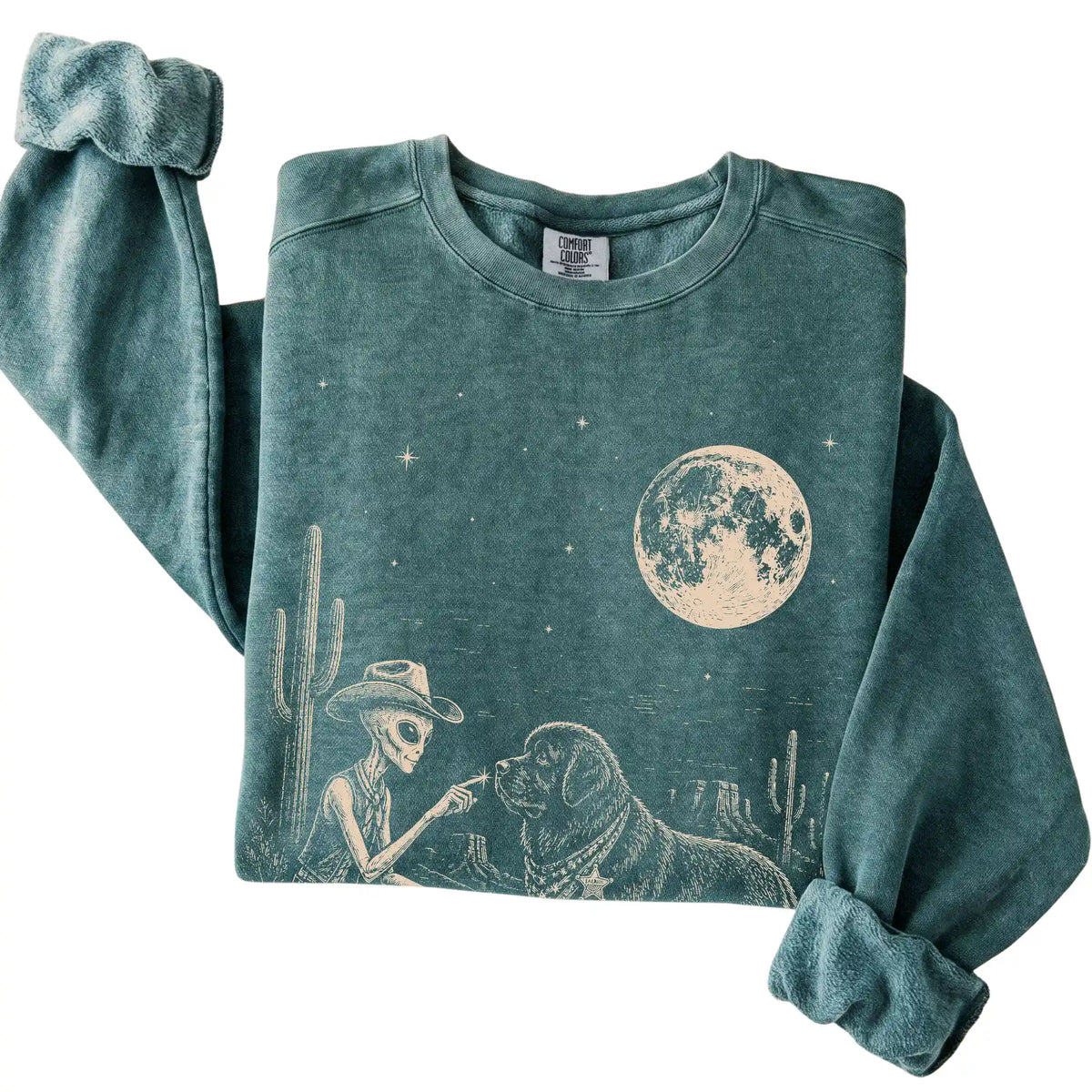 Blue Spruce Comfort Colors® sweatshirt featuring Newfie Cowboy and Alien, folded presentation