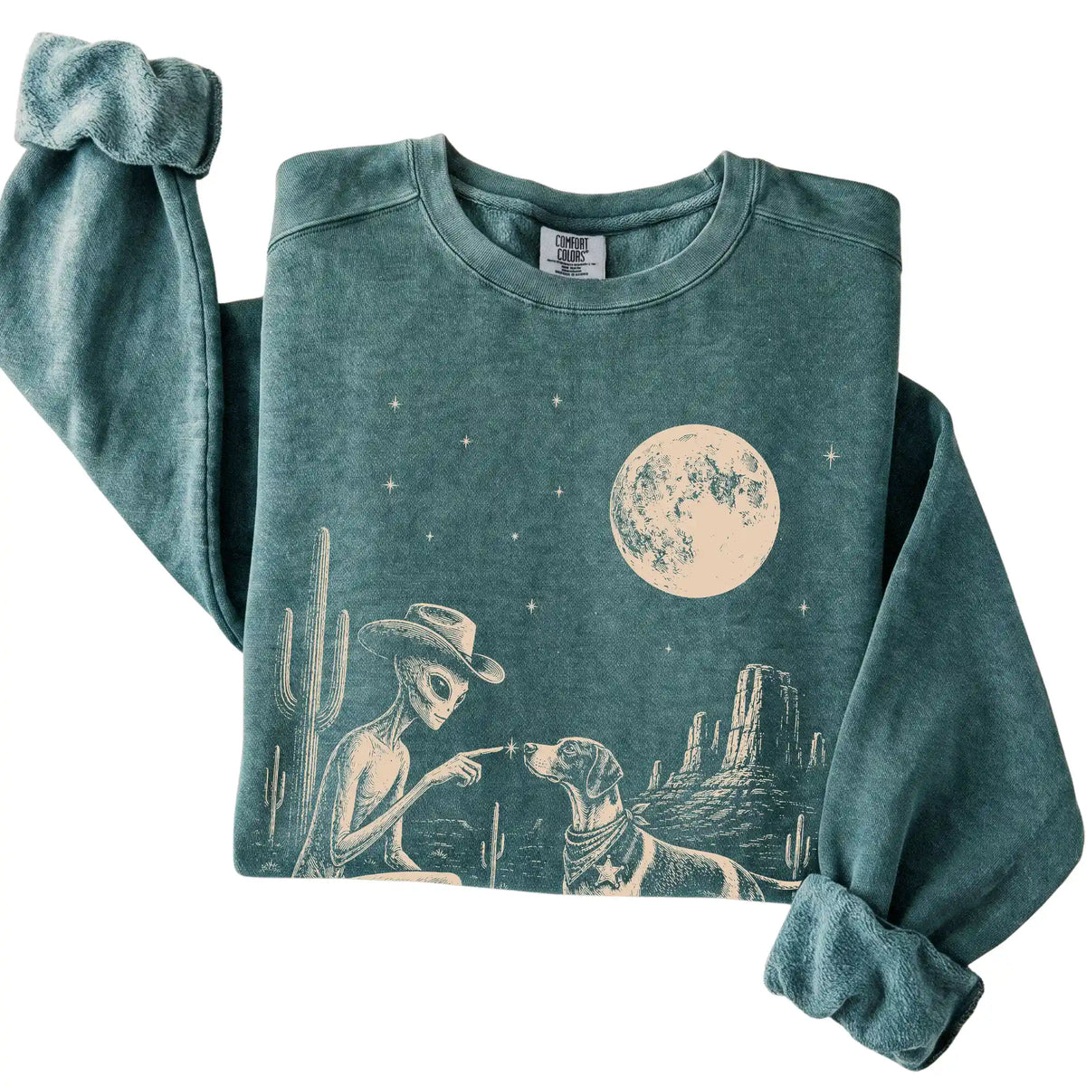 Blue Spruce Comfort Colors® sweatshirt featuring Pointer Cowboy and Alien, folded presentation