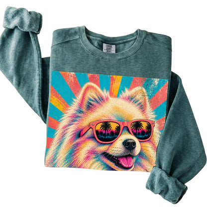 Folded Blue Spruce Comfort Colors sweatshirt with a Retro Pomeranian Mama design