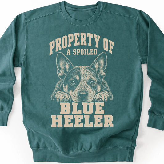 Blue Spruce Blue Heeler sweatshirt with a dog portrait and “Property of a Spoiled” lettering.