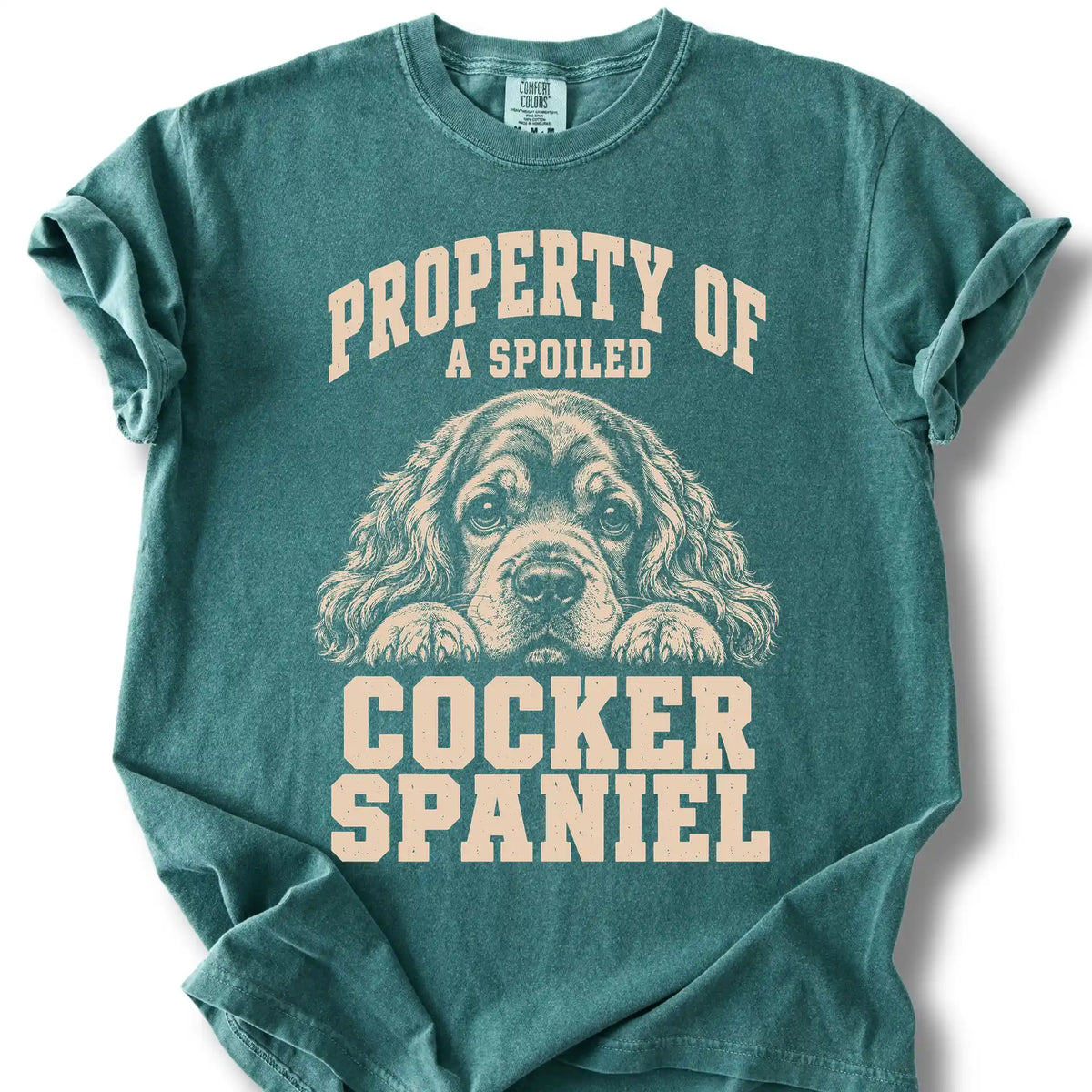 Blue Spruce Cocker Spaniel T-shirt with a dog portrait and “Property of a Spoiled” lettering.