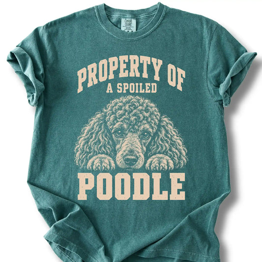 Blue Spruce Poodle T-shirt with a dog portrait and “Property of a Spoiled” lettering.